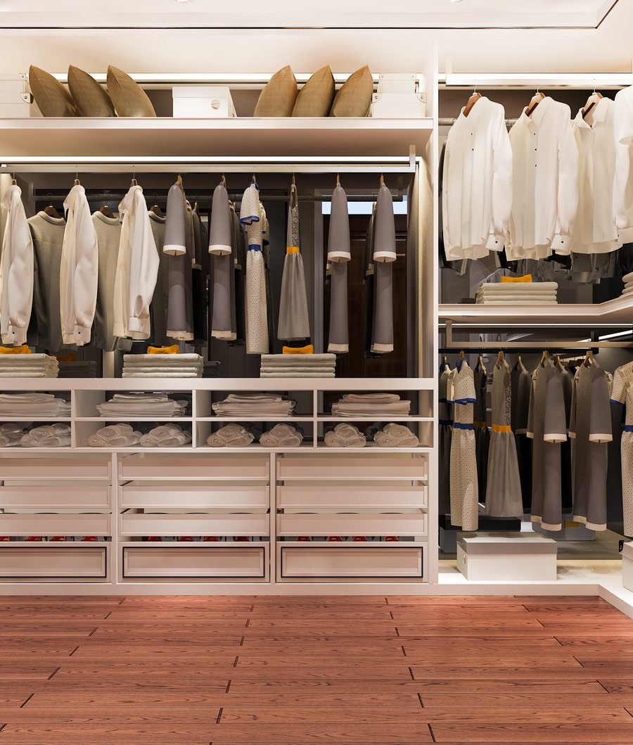 Walk-in wardrobe project with backlit shelving and drawer banks