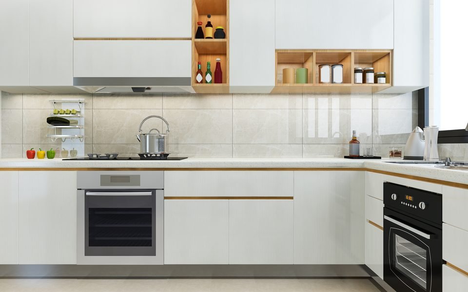 Modular kitchen layout in white and wood with built-in appliances